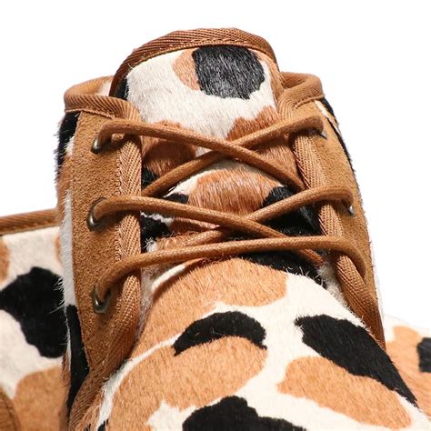 Get Spotted in Style with Neumel's Cow Print Shoes